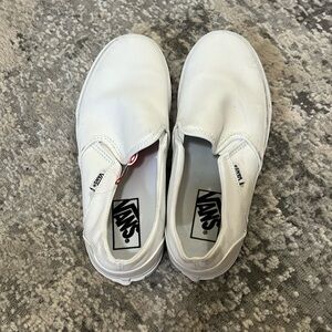 Brand new never worn white slip on vans